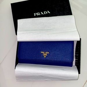 Brand new in box Prada Bluette Wallet with an ID insert. with authenticity card